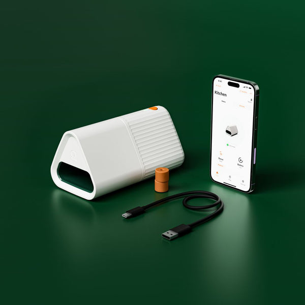 A24 rat and mouse smart trap with USB cable and smartphone showing app interface for rodent control system